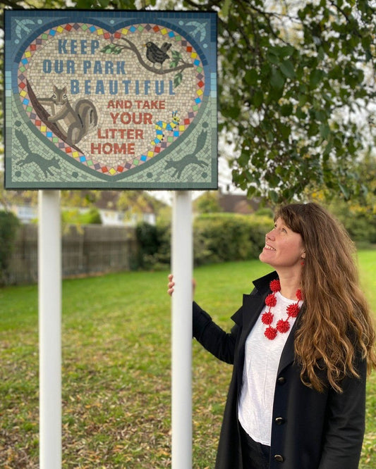 Local mosaic artist with Anti-litter message Community art project